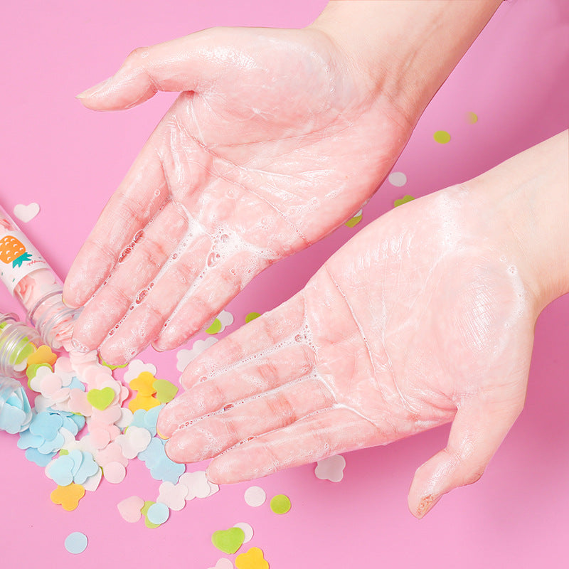 Colorful flower-shaped paper soap strips in a portable test tube bottle