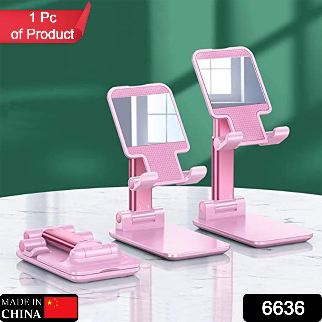 Adjustable phone stand with mirror on a desk, showcasing its compact design.