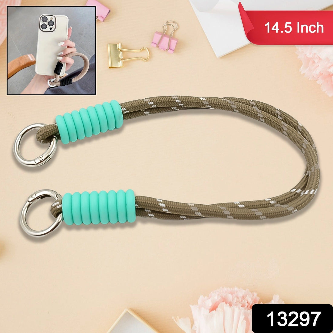A phone with a vibrant multi-colored phone wrist strap attached, held securely.