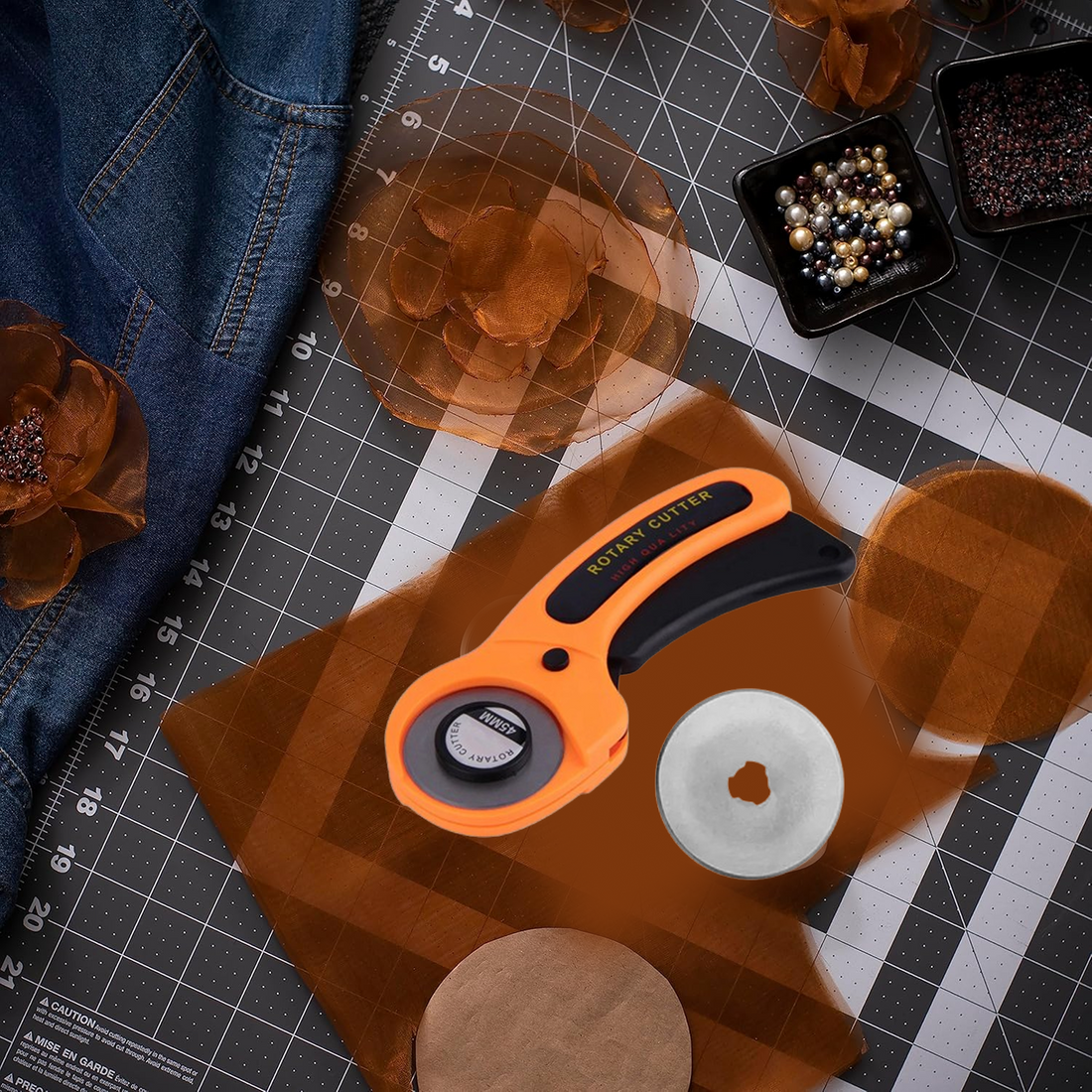 Heavy duty 45mm rotary cutter showing sharp blade and safety lock