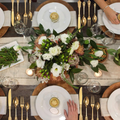 Shining golden dessert spoons from the complete 24-piece cutlery collection.