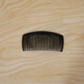 Packaged plastic hair comb for everyday use