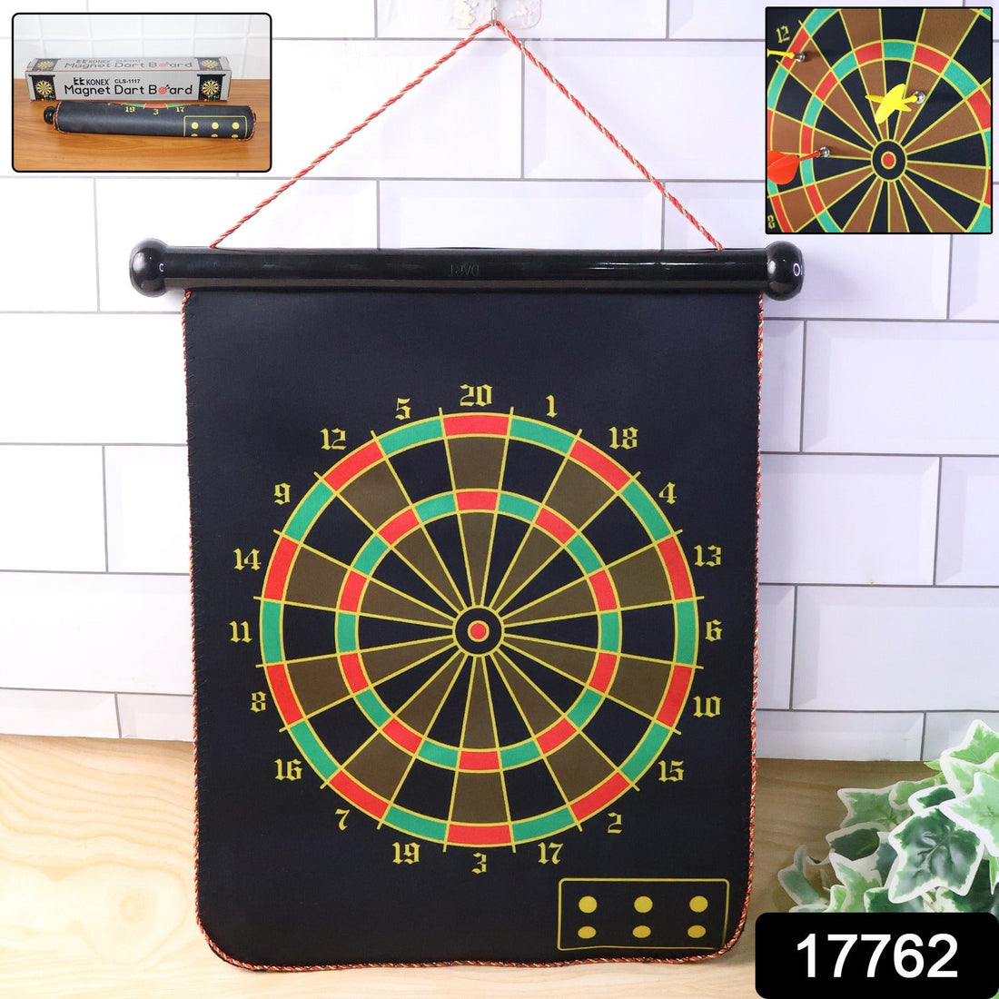 Foldable magnetic dart board set with double-sided design hanging on wall