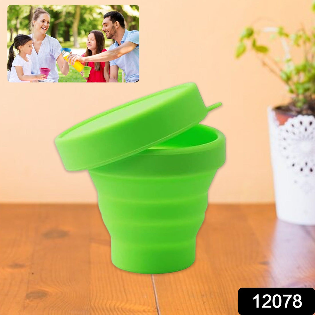 Collapsed foldable silicone travel mug with lid, ready for packing.