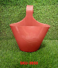 Single hanging planter pot on a balcony railing.