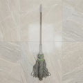 Spin mop in use for floor cleaning