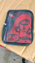Side view of compact multipurpose zipper pouch with traditional design