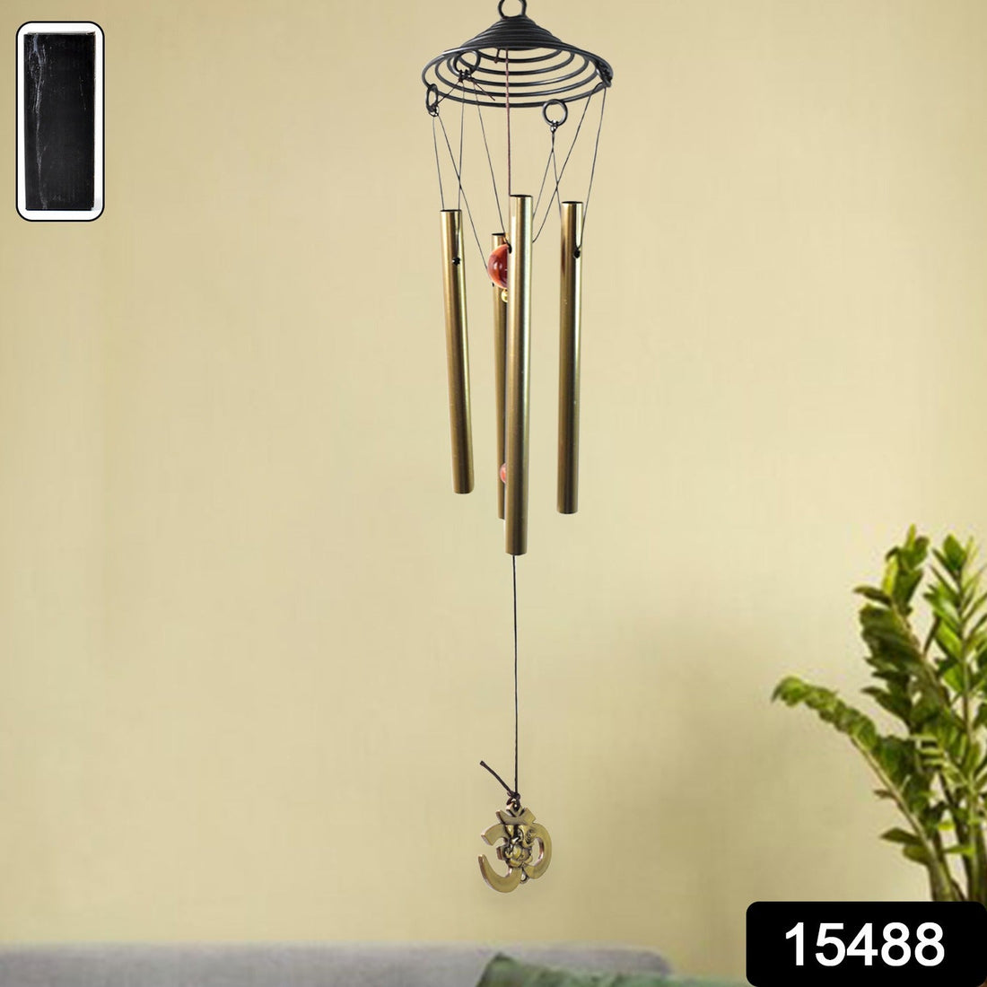Dragonfly outdoor wind chime with vibrant colours in garden setting