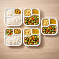 Side angle image of heat and oil resistant 3-compartment bagasse square plate