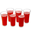 Group of six empty transparent plastic water glasses arranged neatly.