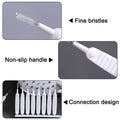 The multifunctional brush set shown cleaning small holes of a shower head.