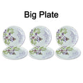 High-quality 32-piece plastic tableware set displayed on a table.