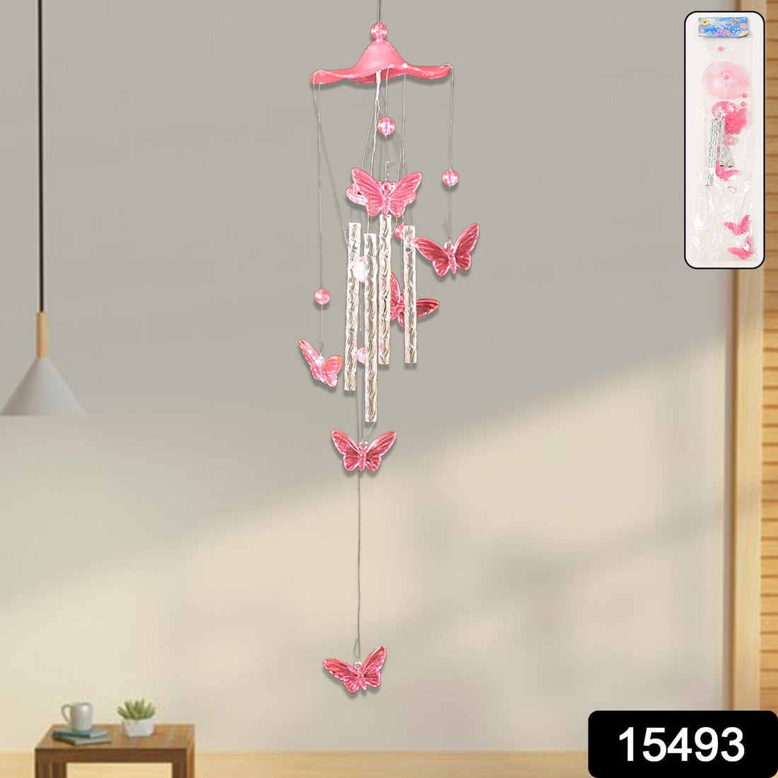 Butterfly Bell Wind Chime hanging outdoors with colourful butterfly design