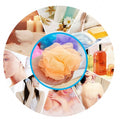 Bath loofah with an extended back scrubber handle for easy reach.