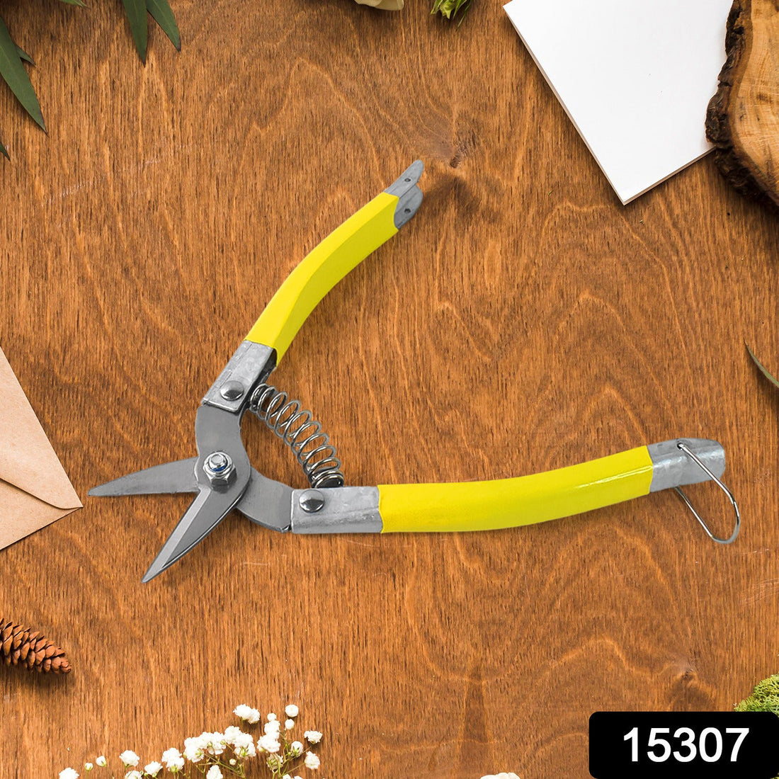 Close-up of precision micro garden snip pruning scissor with ergonomic grips