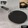 Flat roti tawa heating evenly on gas stove burner