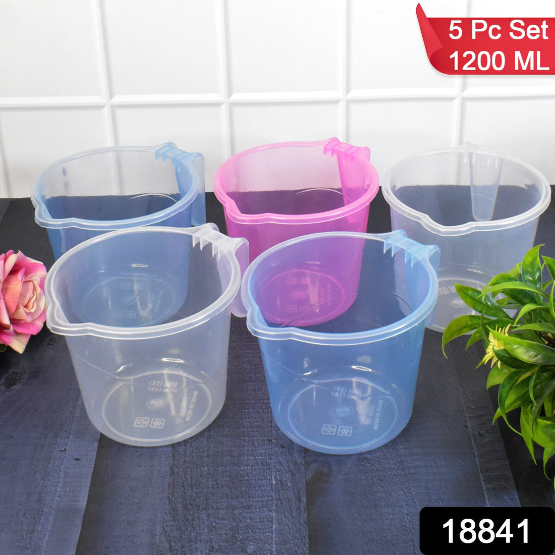 Transparent plastic bath mug in a mix of colours, perfect for daily use.