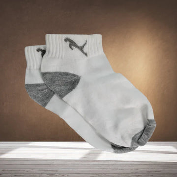 A single pair of colourful printed socks for women, laid flat on a white surface.