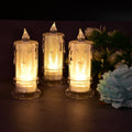 Three Melted Design Flameless Candles glowing softly on a decorative surface, enhancing home ambiance.