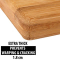 Fresh vegetables being prepared on the spacious wooden cutting board.