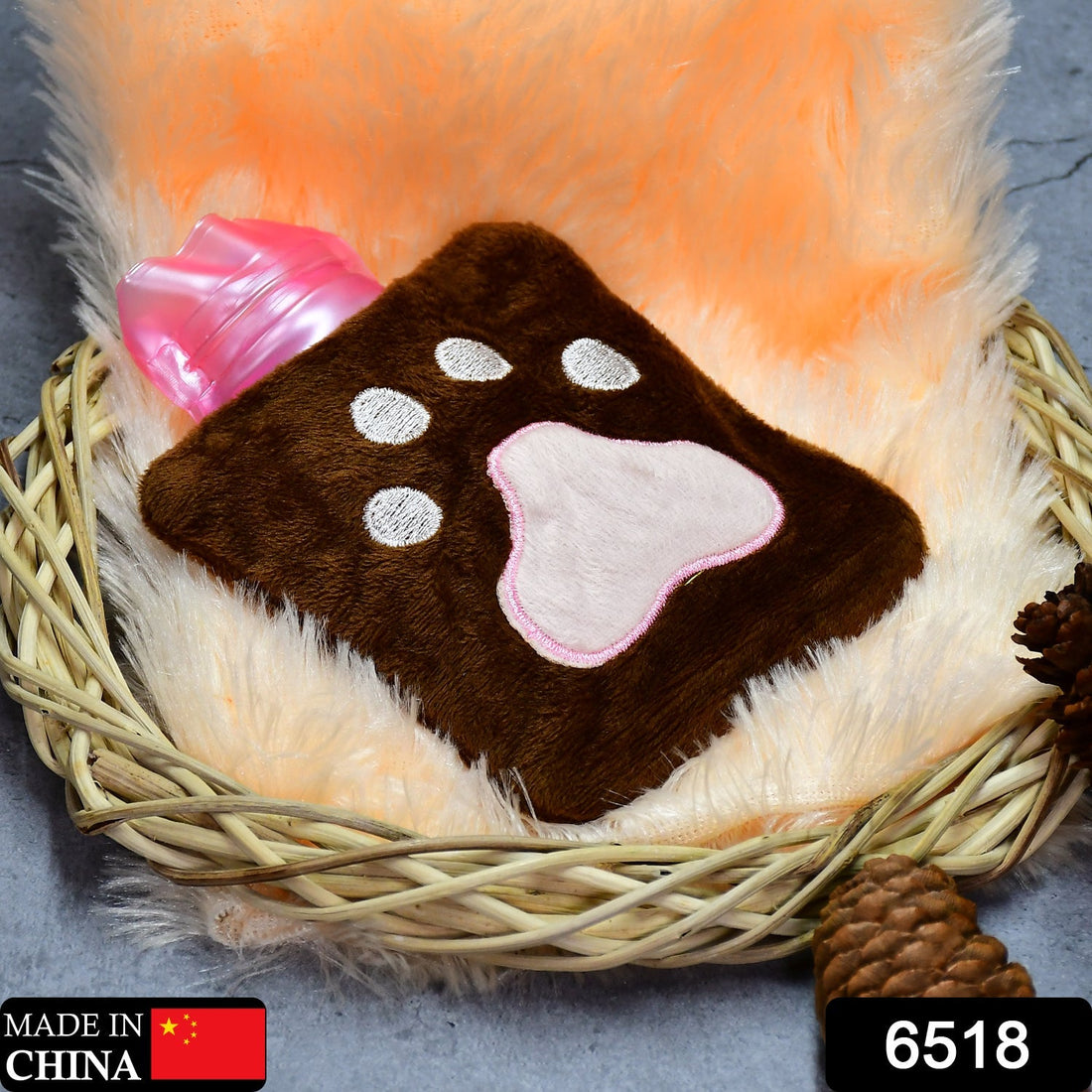 Small Paw Print Hot Water Bag with soft cover showing even heat distribution.