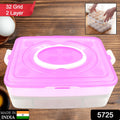 Person holding portable 32-grid egg storage tray by handle