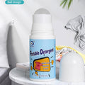 Portable stain remover being applied directly onto a garment.