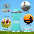 The folding refillable silicone water bottle demonstrated in its compact, space-saving size.