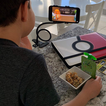 Flexible phone stand with 360-degree rotation for hands-free viewing.
