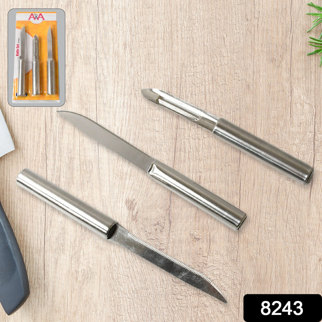 Cisora 3-piece stainless steel kitchen knife set laid out on a white background