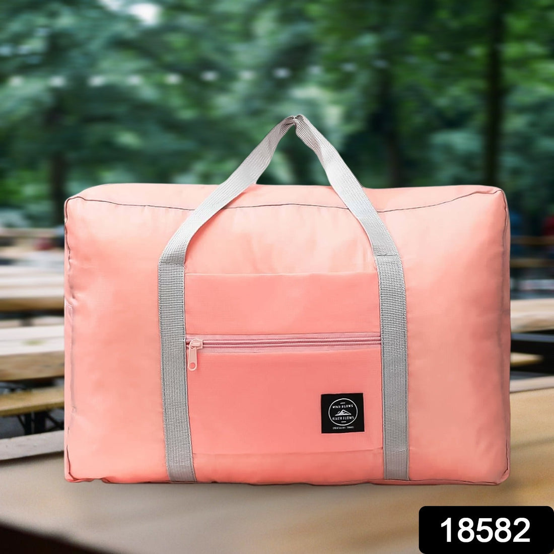 Large Foldable Travel Bag in blue, unfolded and ready for packing.