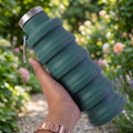 Leak proof stainless steel cap on silicone water bottle