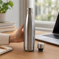 Durable stainless steel water bottle in silver, perfect for gym and school.