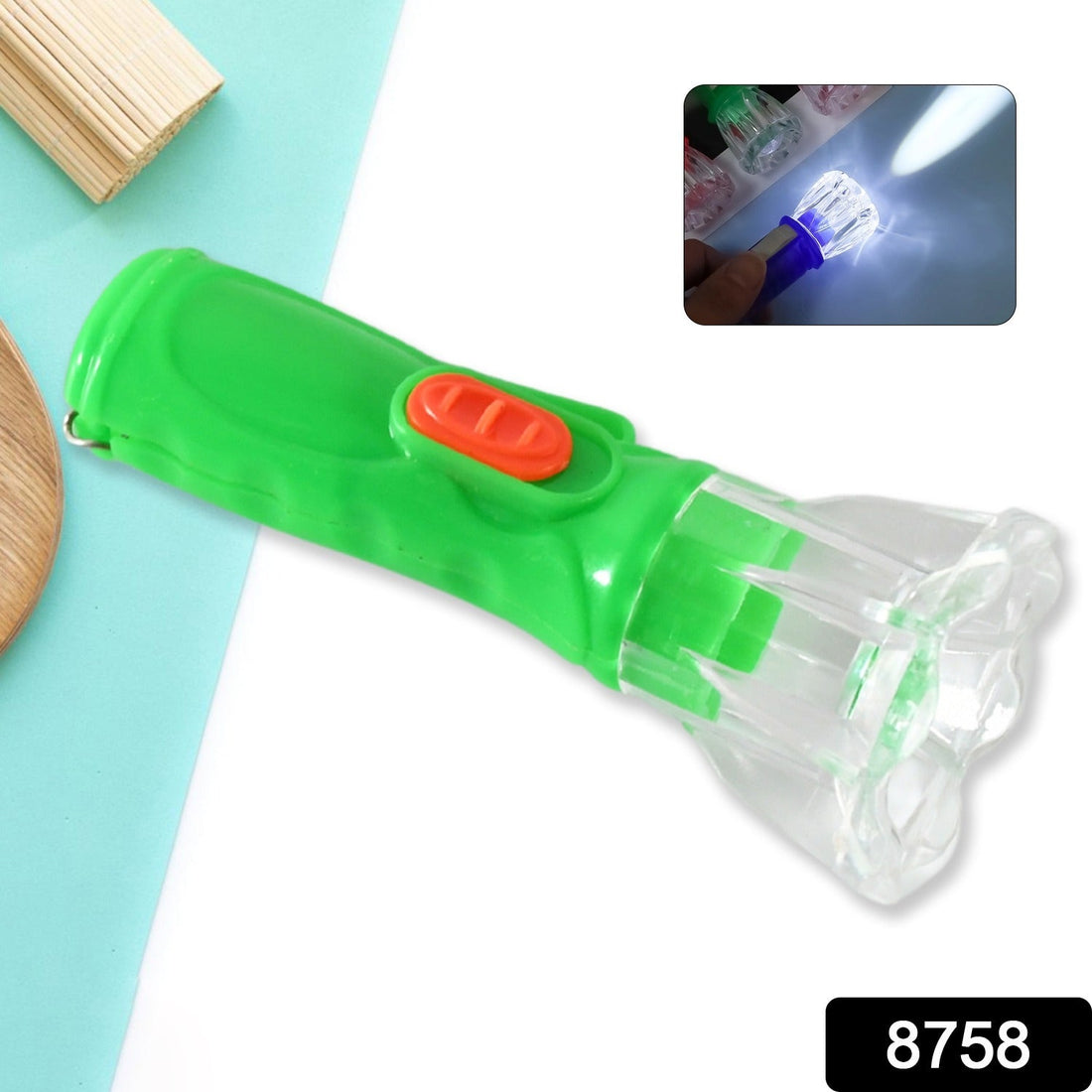 A child's hand holding a compact Kids LED Torch for an adventure.