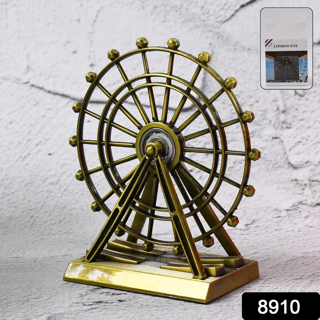 Metal desktop wheel tower ornament with intricate design on table