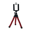 White mini tripod stand on a plain background for mobile use