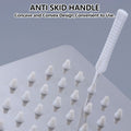 The shower nozzle cleaning brush set ready for use in a bathroom setting.