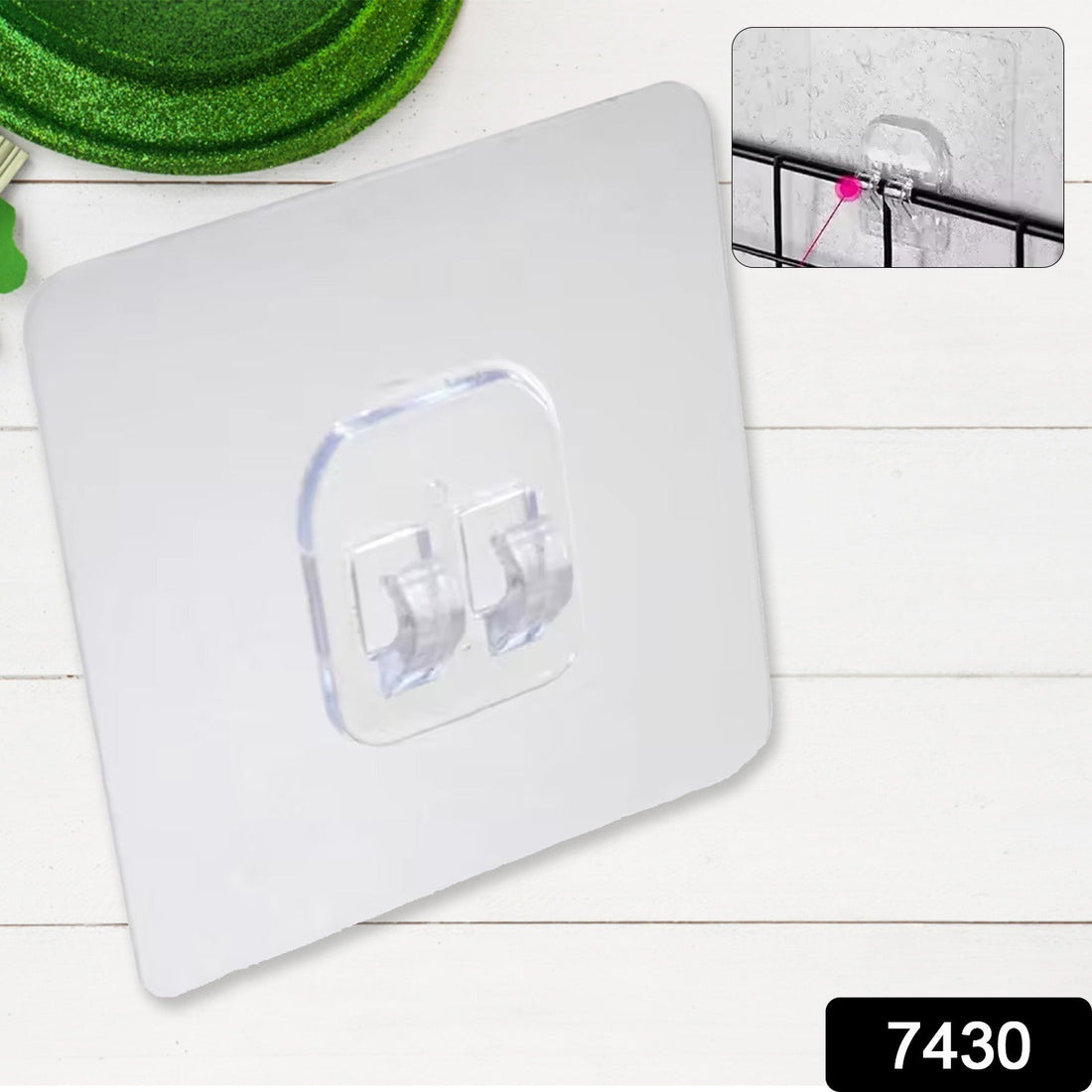 Waterproof self-adhesive wall hook applied to a clean bathroom tile surface.
