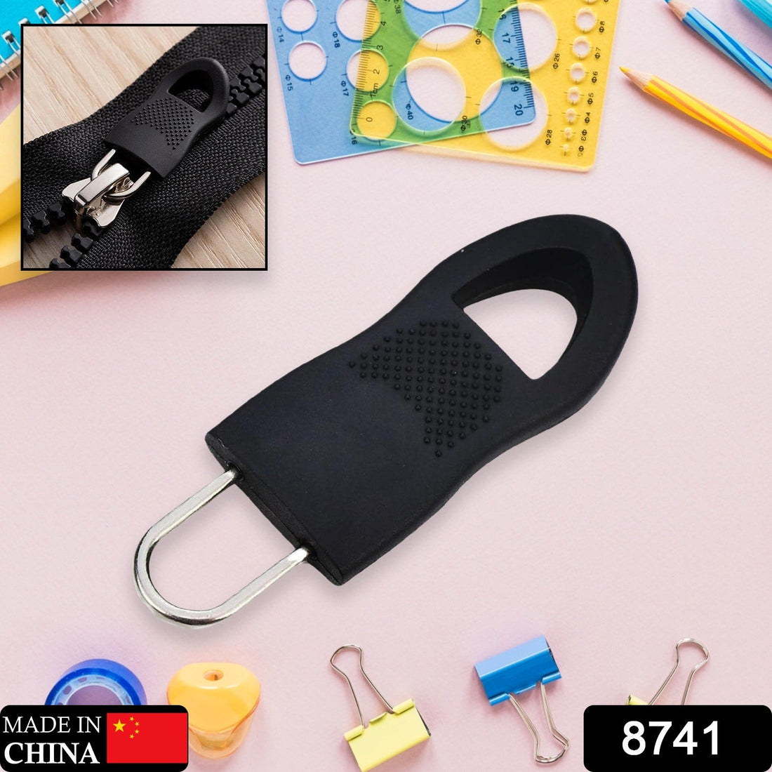 Close-up of a black Zipper Pull Tab with a durable cord and metal head, ready for attachment.