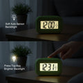 Digital alarm clock suitable for bedroom or office use
