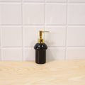 Decorative black glass soap dispenser for modern bathrooms