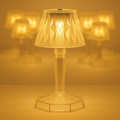 The crystal table lamp showcasing its unique reflection light effect in a dark room.