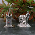 Elegant silver-plated Kamdhenu cow and Tulsi plant pair for religious blessings