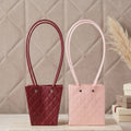 Bag used for bouquet packaging in floral shop setting