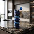 Side view of expanded colorful collapsible silicone water bottle