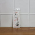 Bal Krishna Makhan Chor keychain attached to vehicle keys adding a spiritual charm