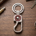 Heavy-duty metal keychain with secure lock feature for outdoor & travel use.