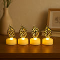 Close-up of a single golden leaf LED candle showcasing its textured design and warm glow.