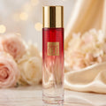 Unisex Eau de Parfum spray with elegant red ombre bottle