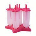 Frozen colorful popsicles made with BPA-free plastic ice cream molds on table